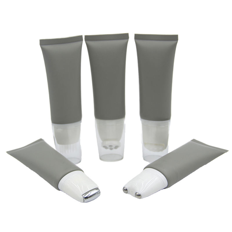 Tubos de crema cosmética de función especial OEM con cepillo de silicona, bola de rodillo, lavado de cara suave y tubo de masaje de embalaje de crema para ojos