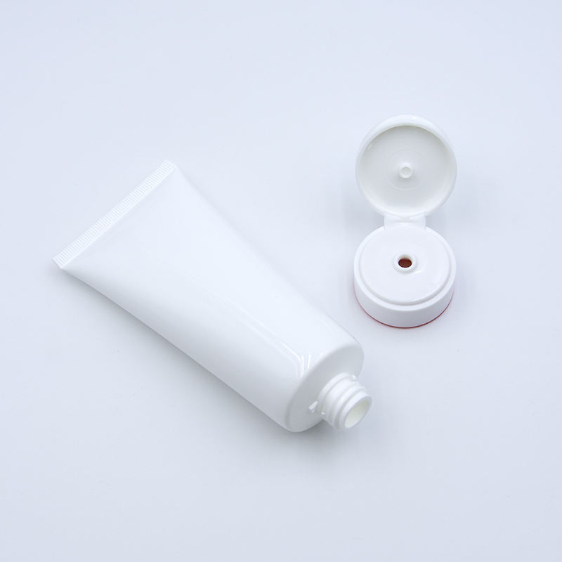 Tubo de plástico cosmético suave para apretar loción de PE vacío personalizado con tapa abatible para superficie de lavado de cara manejada mediante estampado en caliente