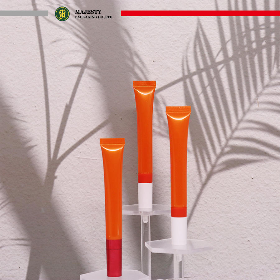 Embalaje de tubo cosmético de plástico vacío, tubo de bálsamo labial para crema de ojos, aplicador de masaje de aleación de Zinc o cerámica, embalaje de tubo para cuidado de la piel