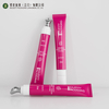 Tubo de plástico de embalaje cosmético vacío personalizado, aplicador de Metal de aleación de Zinc vibrante, cabezal de suero, masaje para apretar, crema para ojos y labios