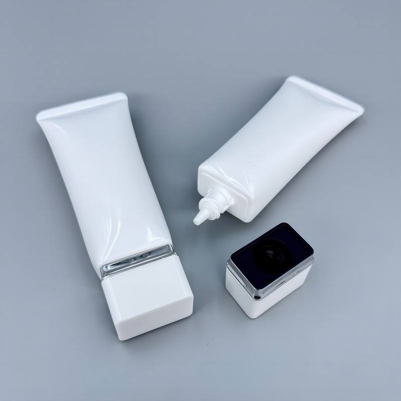 Envase exprimidor de crema de manos de tubo cosmético de PE de plástico blando de forma cuadrada con material de papel de etiquetado para cuidado de la piel y lápiz labial