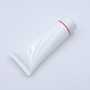 Tubo de plástico cosmético suave para apretar loción de PE vacío personalizado con tapa abatible para superficie de lavado de cara manejada mediante estampado en caliente