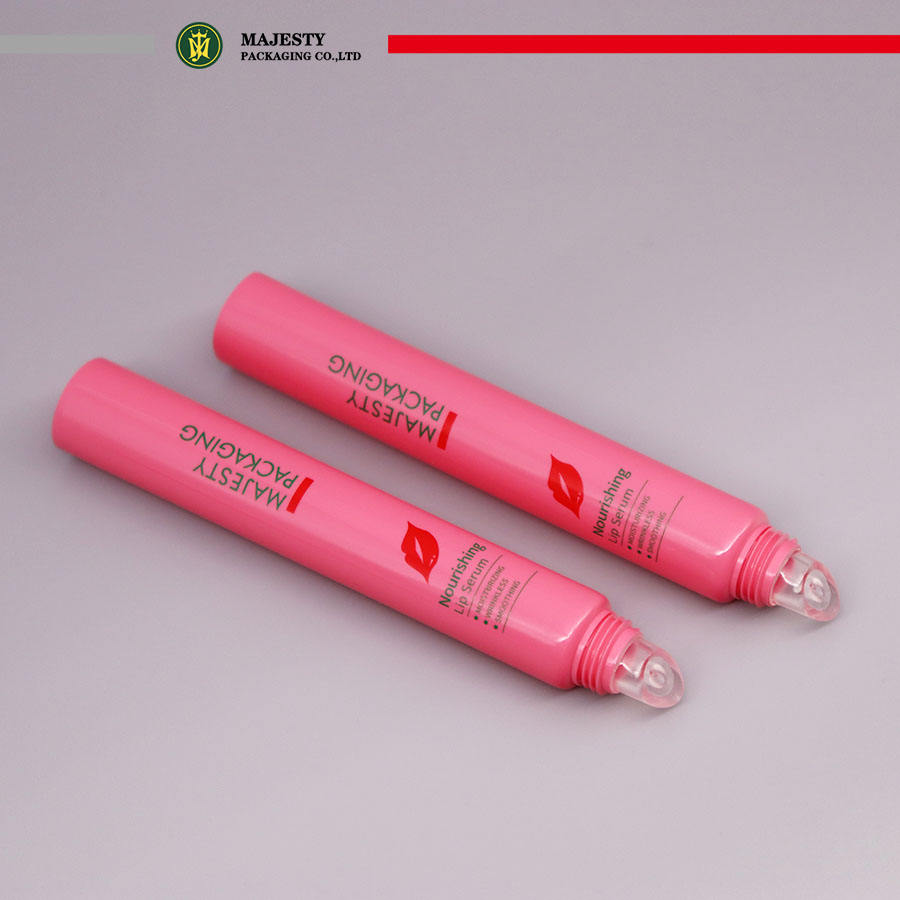 Tubos de empaquetado de la tapa del protector labial plástico de encargo con el tubo plástico del lustre del labio del aplicador del silicón