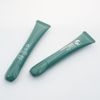 Tubo de plástico para crema para ojos, aplicador puntiagudo, tapón de rosca Irregular único, tubo para cuidado de la piel, embalaje de tubo de plástico cosmético