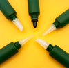 Envases de bálsamo labial personalizados, redondos de plástico, respetuosos con el medio ambiente, populares, con aplicador flocado, protector solar, crema para ojos, máscaras para el cuidado de la piel
