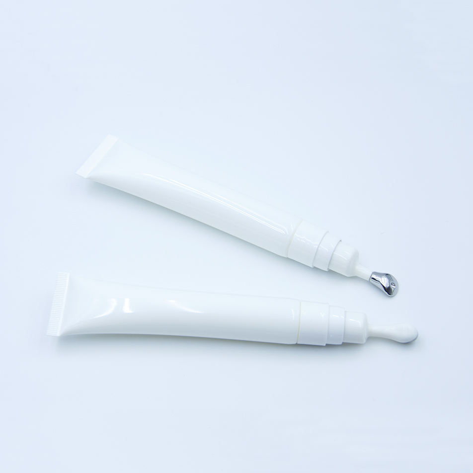 Envase cosmético vacío de alta calidad personalizado, tubo de esencia de crema para ojos de aleación de Zinc con logotipo personalizado, cabezal de masaje vibratorio, 20ml