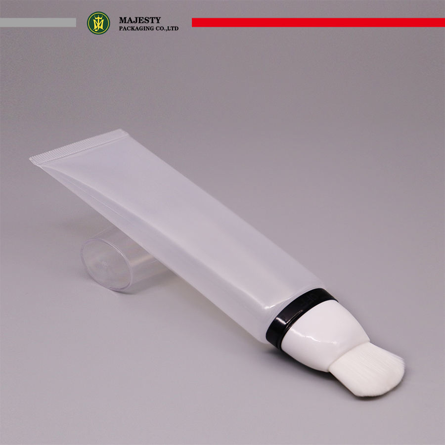 Tubo de plástico vacío personalizado con aplicador de cepillo suave para tubo de base cosmética