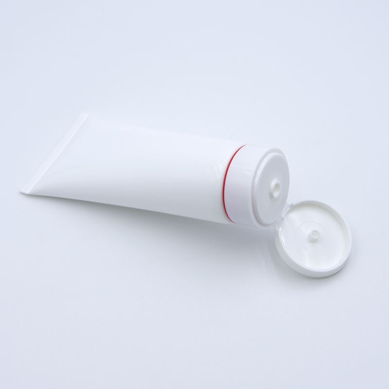 Tubo de plástico cosmético suave para apretar loción de PE vacío personalizado con tapa abatible para superficie de lavado de cara manejada mediante estampado en caliente