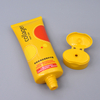 Tubo cosmético de plástico de compresión suave con forma ovalada para el cuidado de la piel, nueva serie, tapa abatible, crema para manos, loción y champú, tamaños de 50ml y 100ml