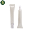 Embalaje de tubo cosmético de plástico vacío para bálsamo labial Eyecream 10ml 15ml 30ml forma redonda con aleación de zinc o tubo aplicador de cerámica