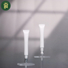 Tubo de plástico de la nueva serie popular con aleación de zinc o aplicador de cerámica Tapa PETG Tubo cosmético de plástico Embalaje Bálsamo labial Lápiz labial