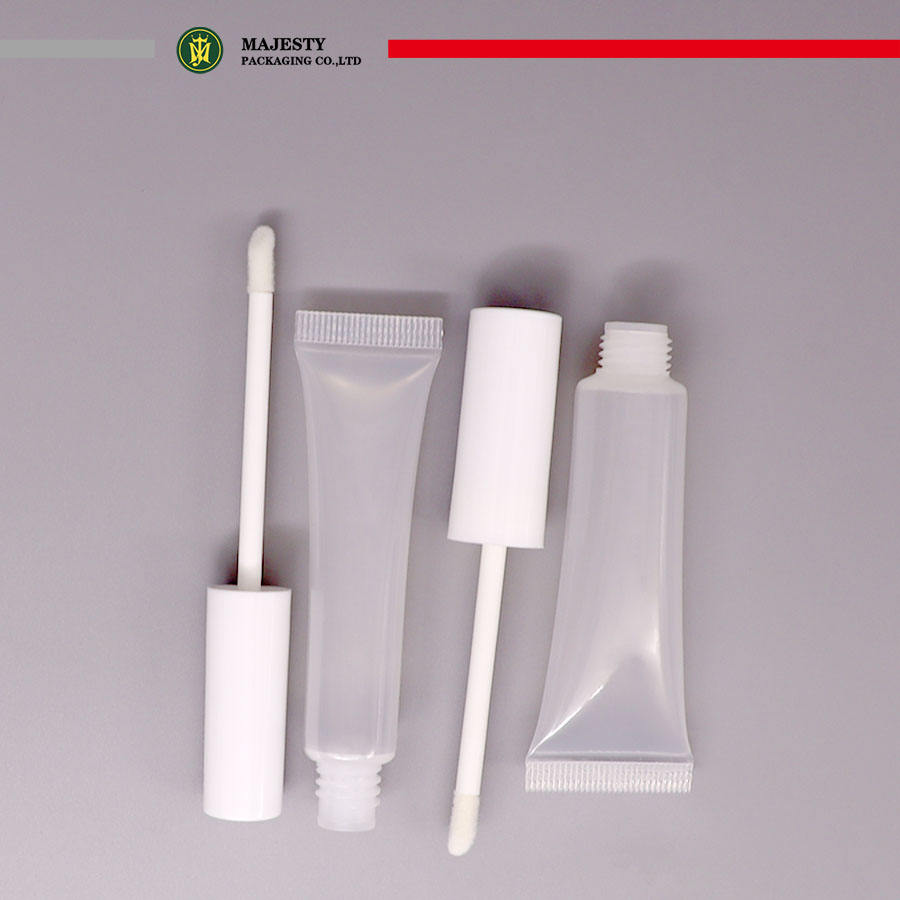 Lápiz labial vacío, brillo de labios, tubo de plástico, cuidado de la piel, embalaje cosmético, aplicador de cepillo, embalaje personalizable de plástico fácil de usar