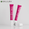 Tubo de plástico de embalaje cosmético vacío personalizado, aplicador de Metal de aleación de Zinc vibrante, cabezal de suero, masaje para apretar, crema para ojos y labios