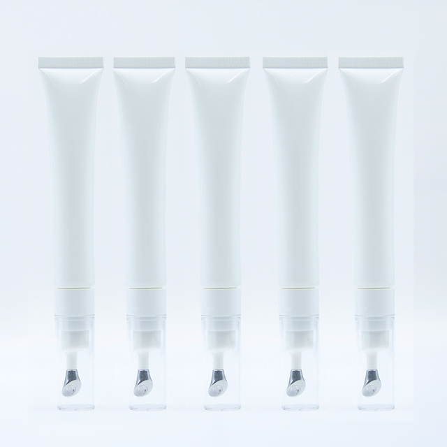 Envase cosmético vacío de alta calidad personalizado, tubo de esencia de crema para ojos de aleación de Zinc con logotipo personalizado, cabezal de masaje vibratorio, 20ml