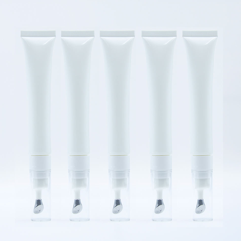 Envase cosmético vacío de alta calidad personalizado, tubo de esencia de crema para ojos de aleación de Zinc con logotipo personalizado, cabezal de masaje vibratorio, 20ml