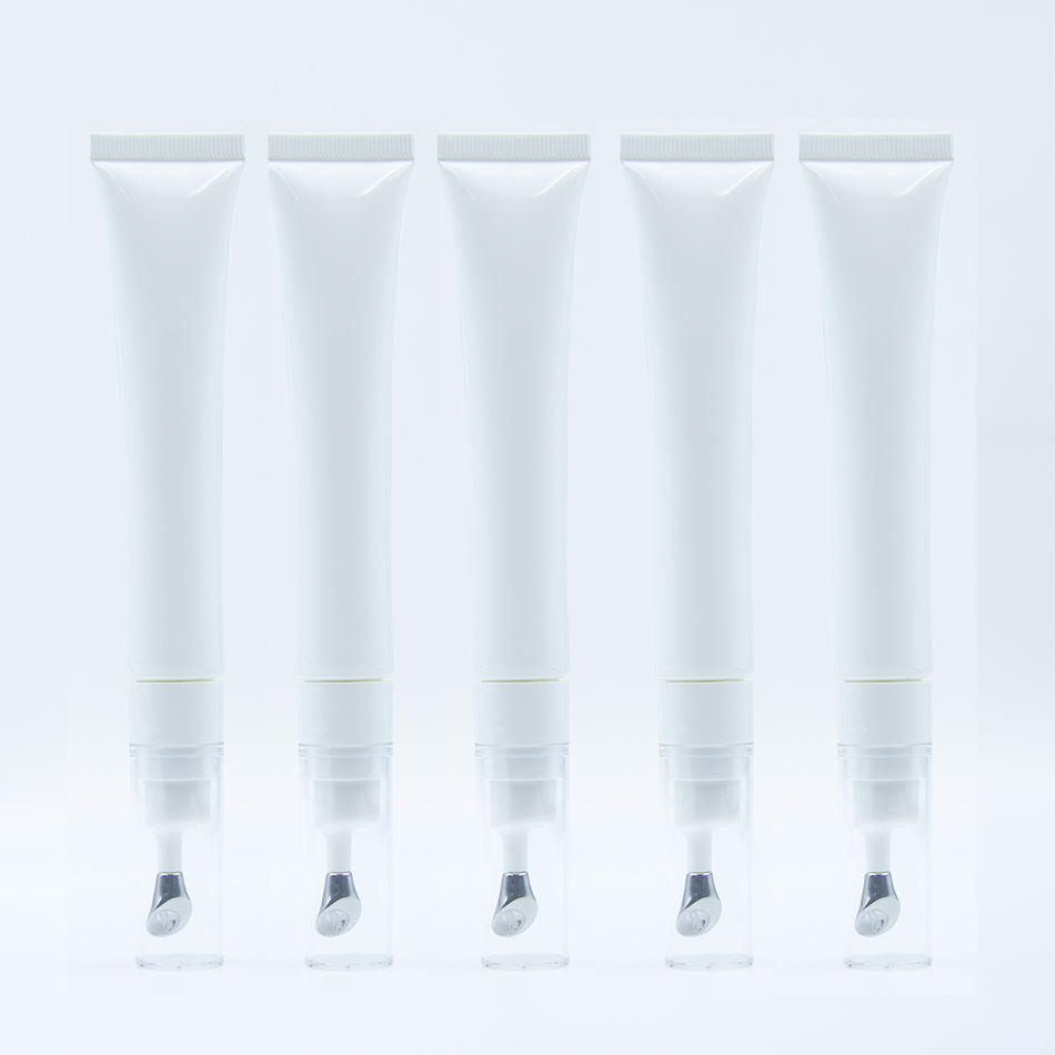 Envase cosmético vacío de alta calidad personalizado, tubo de esencia de crema para ojos de aleación de Zinc con logotipo personalizado, cabezal de masaje vibratorio, 20ml