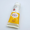 Tubo exprimidor de plástico blando OEM con tapa abatible para crema de manos, lavado de cara, cuidado de la piel con loción cosmética de superficie de estampado en caliente