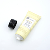 Tubo de lavado de cara cosmético suave OEM con superficie de estampado en caliente de tubo cosmético de plástico con tapa abatible