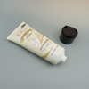 Etiquetado personalizado Tubos cosméticos de compresión suave, limpiador facial, tubo de embalaje de plástico con prensa, tapa abierta, embalaje para cuidado de la piel