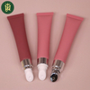 Tubos vacíos personalizados de compresión suave para máscara de lápiz labial y cuidado de la piel con aplicador de aleación de zinc y suero de masaje para ojos para el cuidado de los labios