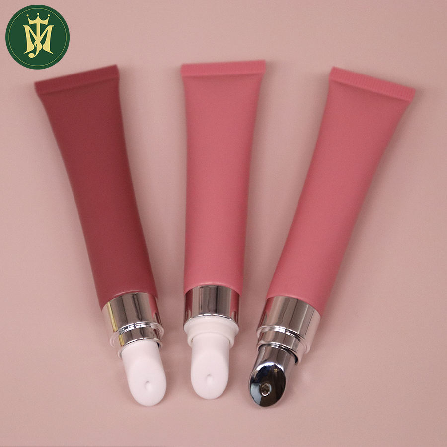 Tubos vacíos personalizados de compresión suave para máscara de lápiz labial y cuidado de la piel con aplicador de aleación de zinc y suero de masaje para ojos para el cuidado de los labios